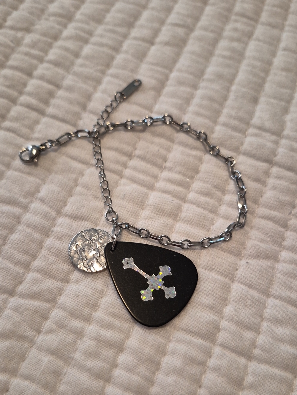 Stainless Steel Bracelet with Black Guitar Pick and Iridescent Cross